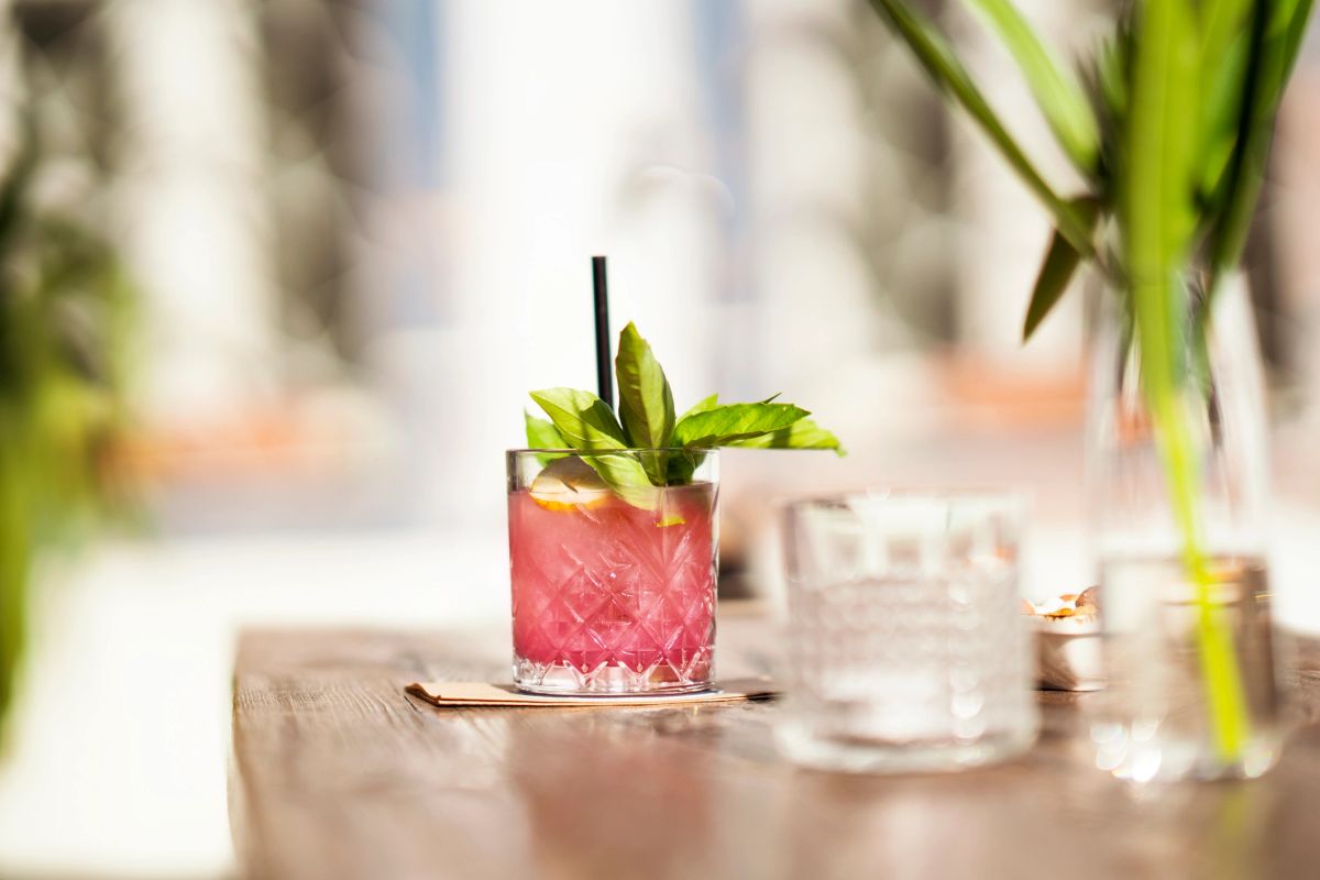 The Mocktail Tan at Organic Shimmer — red light plus airbrush spray tan